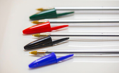 ballpoint pens in different colors. Old and traditional pens.