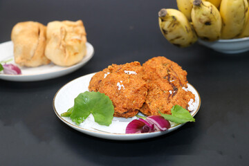 Samosa or singara,traditional food isolated on black background.