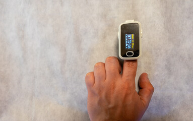 Index finger using oxygen measurements, oximeter.