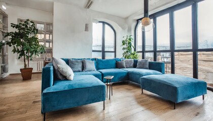 scandinavian style interior design of modern living room with blue big sofa light oak floor big windows