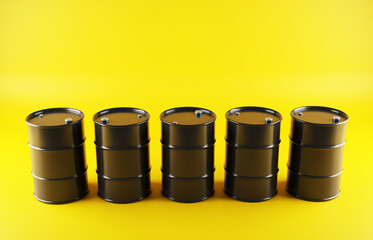 Black oil barrels on yellow background. 3d-rendering