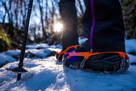 Trekking boots on a trail in winter