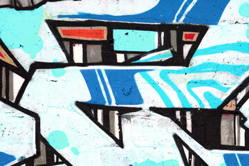 Colorful background of graffiti painting artwork with bright aerosol outlines on wall. Old school street art piece made with aerosol spray paint cans. Contemporary youth culture backdrop