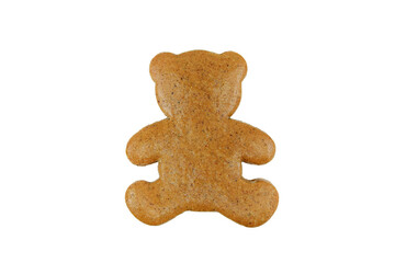 Undecorated gingerbread in a shape of bear isolated on white background
