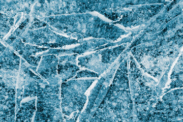 Ice texture. The textured blue cracked rough cold frosty surface of the ice background. - 728697879