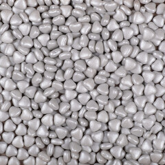 Colorful and bright cake decorations, in powder and granule form, can also be used as a colorful background.