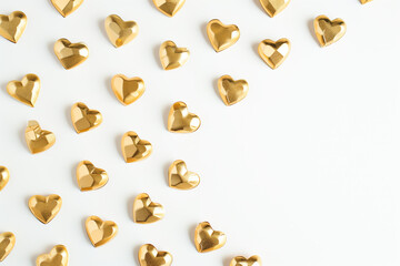 Minimalist Love: Golden Hearts on a Pristine White Background