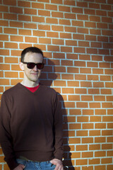 Obraz premium Jovial man in positive and calm attitude