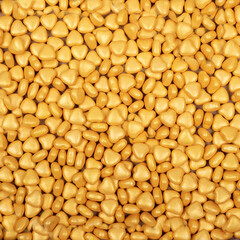 Colorful and bright cake decorations, in powder and granule form, can also be used as a colorful background.