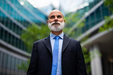 Confident businessman in urban setting