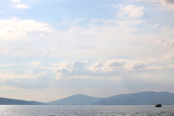 Bright blue sea and clear sky. Copy space.