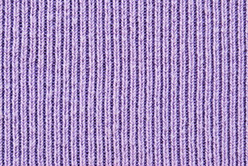 Soft purple color ribbed knit fabric pattern close up as background
