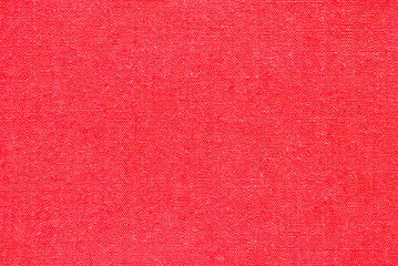 Red canvas texture, red color cotton fabric pattern close up as background