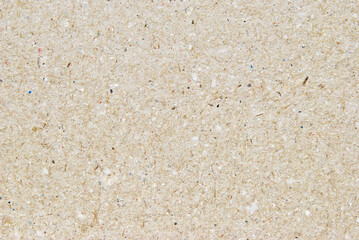 A sheet of beige recycled craft paper texture as background
