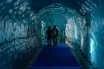 Ice Cave drilled in Mer de Glace glacier, popular tourist attraction, Chamonix, France