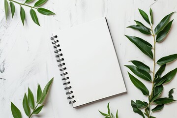 mockup of a blank small notebook laying on a traditional light colored desk 