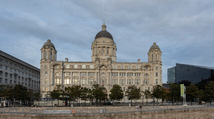 Obraz premium Liverpool, united kingdom May, 16, 2023 The facade of the Port of Liverpool Building, or Dock Office, one of the Three Graces located at the Pier Head, 