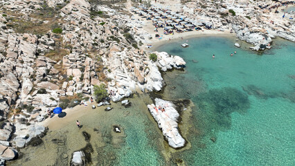 Aerial drone photo of famous small organised beach with unique rock formations of Kolimbithres or...