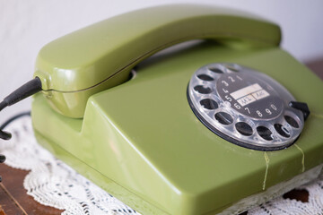 green Rotary Telephone with Disc Dial, Old Phone with Cracks, Connecting with Past, calls helpline,...