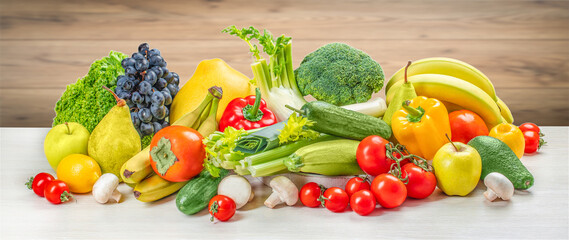 Composition with raw organic vegetables on a wooden table. Long banner format