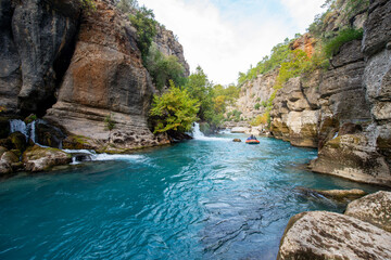 Transparent waters of Kopru River (Köprüçay, ancient Eurymedon) with its emerald green colour in Koprulu Canyon (Köprülü Kanyon) National Park, Antalya, Turkey. It's a rafting paradise