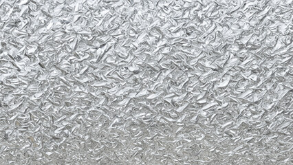 metallic texture with a wet shine. Metallic waves of silver color. Modern background