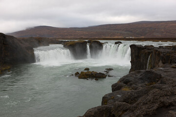 Iceland Godafoss waterfall on a cloudy summer day.