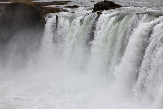 Iceland Godafoss waterfall on a cloudy summer day.