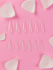 Step-by-step instructions for nail extension on gel tips. Manicure, hands in the foreground. Pink background. Copy space