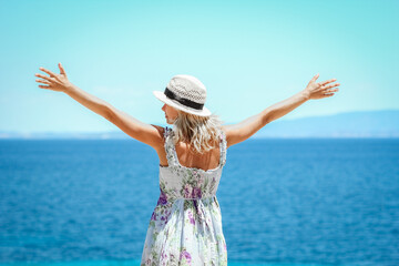 A Happy girl near the seashore in nature weekend travel