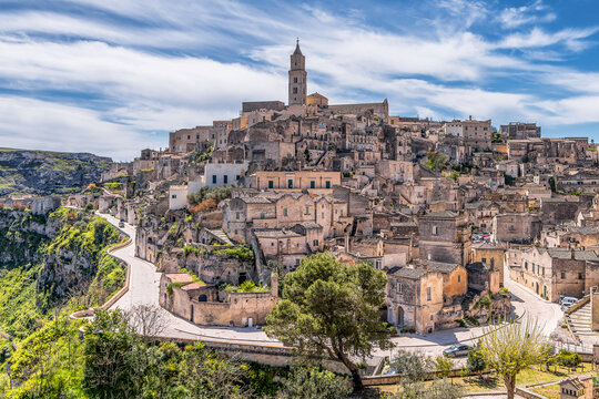 Scenic view of the city of Matera in Italy against dramatic sky 