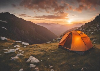 camping tent high in the mountains at sunset