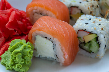 Philadelphia rolls with red ginger and wasabi