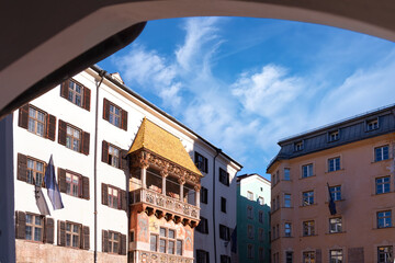 View to the famous Golden Roof (Goldenes Dachl) in Innsbruck, Austria. The roof was built in the 15th century in honor of Maximilian's second marriage.