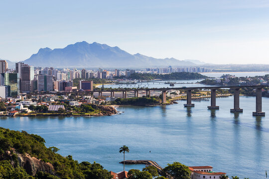 View of the city of Vit&oacute;ria, capital of Esp&iacute;rito Santo, during a beautiful morning with sunshine and blue sea. View from the Penha Convent, in Vila Velha.