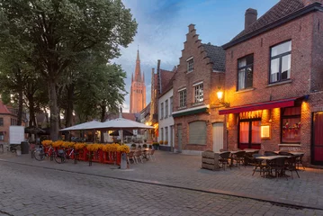 Foto op Canvas Walplein square in medieval fairytale old town in the evening, Bruges, Belgium © Kavalenkava