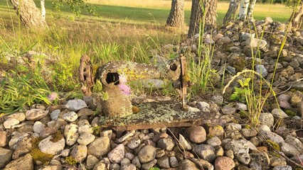 Old sewing machine on the stones