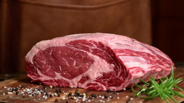 dropping chunk of meat on cutting board