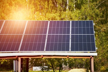 A set of photovoltaic panels mounted on the ground. Solar energy panels outdoors. Solar Park.