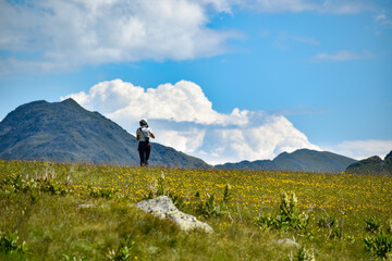 female hiker at Etrachboeden near Soelkpass, Niedere Tauern, Austrian alps