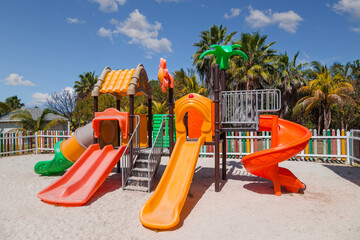 Colorful cildrens playground in a park of Varadero – Cuba. - obrazy, fototapety, plakaty