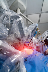 Patient is under surgical robot during surgery