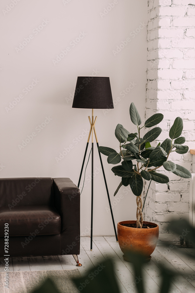 Poster the image features a lamp and a plant in a pot on a table 6085.