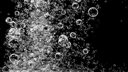 Soda water bubbles splashing underwater against black background. Soda liquid texture that fizzing...