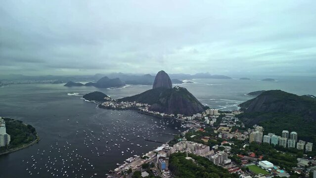 Sugarloaf Mountain in Rio de Janeiro. A peak situated in Rio de Janeiro, Brazil, at the mouth of Guanabara Bay on the South side of the beautiful city located in South America.