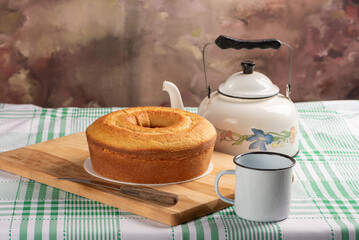 Orange cake, beautiful orange cake and accessories on rustic wood, selective focus.