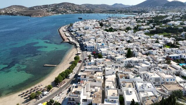 Aerial drone video of traditional settlement of Paroikia with unique Cycladic architecture, Paros island, Cyclades, Greece