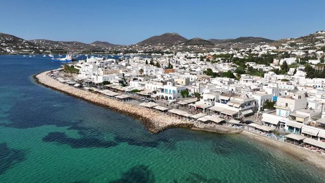Aerial drone video of traditional settlement of Paroikia with unique Cycladic architecture, Paros island, Cyclades, Greece