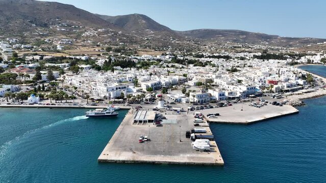 Aerial drone video of traditional settlement of Paroikia with unique Cycladic architecture, Paros island, Cyclades, Greece