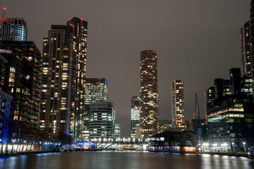 London, United Kingdom - January 26, 2015: View to Canary Wharf across river at night.